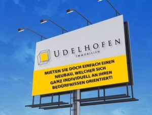 Udelhofen Immobilien Werbetafel im Freien