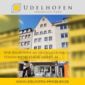 Gebäude mit Udelhofen Immobilien Logo