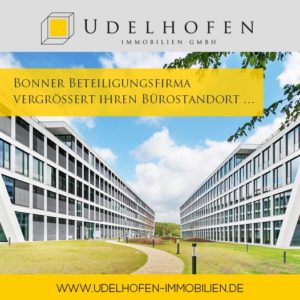 Moderner Bürokomplex mit gelbem Unternehmenstext.